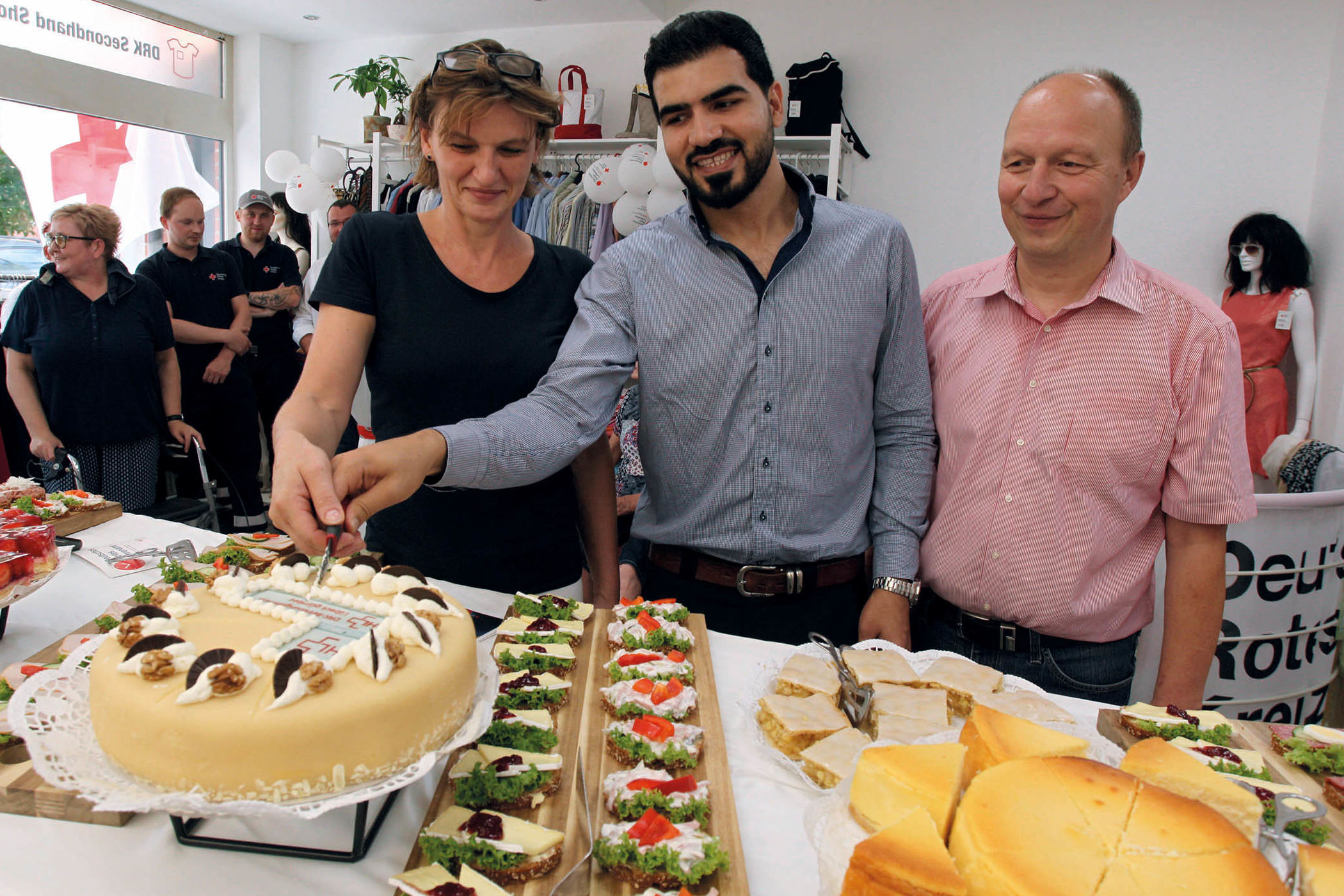 Claudia Krause, Taher Hamad Amen und Stefan Krause 